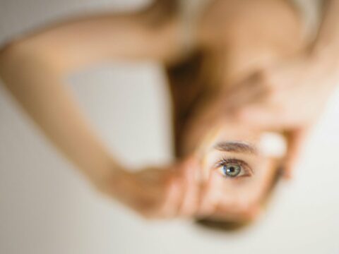 woman holding mirror